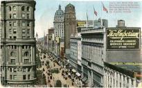 Looking down Market Street from Mason Street showing the Emporium, the Flood Building and Humboldt Bank and Call Building. San Francisco, California.